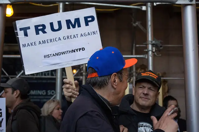 Donald Trump supporters gather outside of a Republican meeting at the Grand Hyatt Hotel in Midtown in April